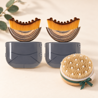 Two face brushes with cases and a free body brush